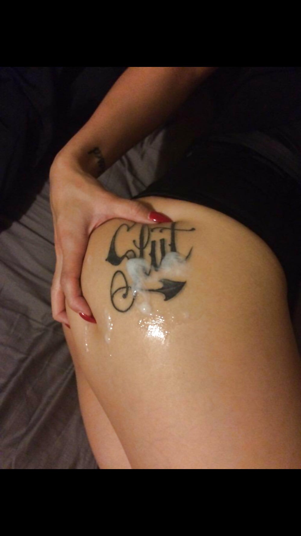 Татуировка "клеймо проститутки"